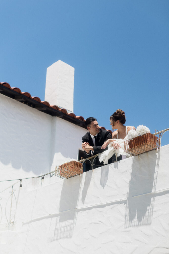 newlywed photo on a balcony