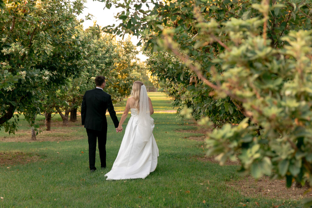 orchard wedding photo newlywed poses